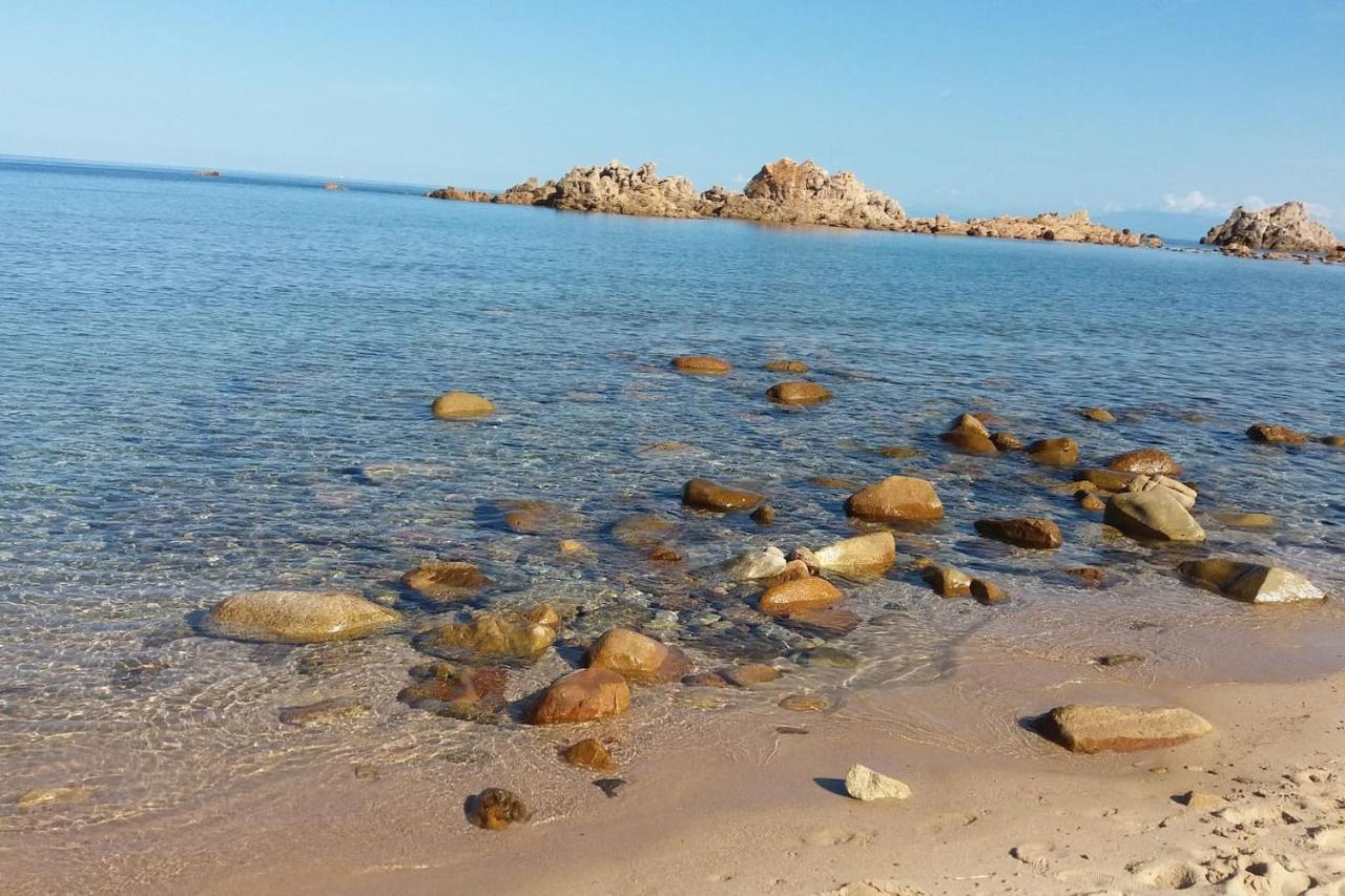 Un Angolo Di Paradiso A Pochi Passi Dal Mare Nel Villaggio Calarossa Isola Rossa Buitenkant foto